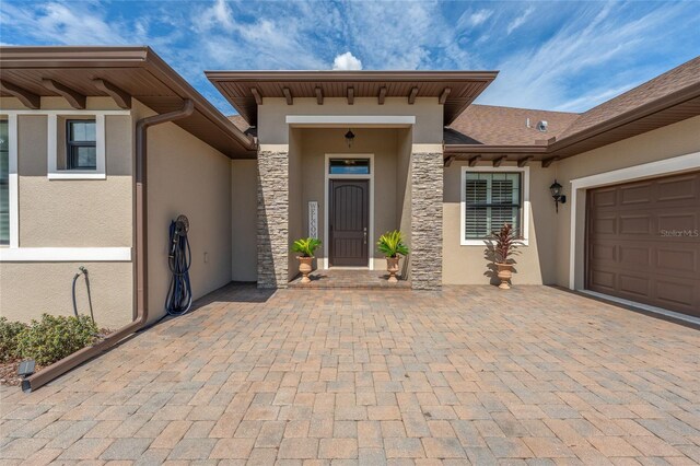 entrance to property with a garage