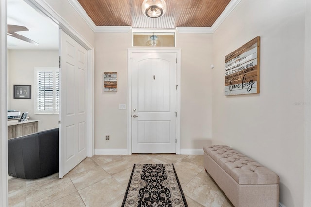 tiled foyer with ornamental molding, wood ceiling, and ceiling fan