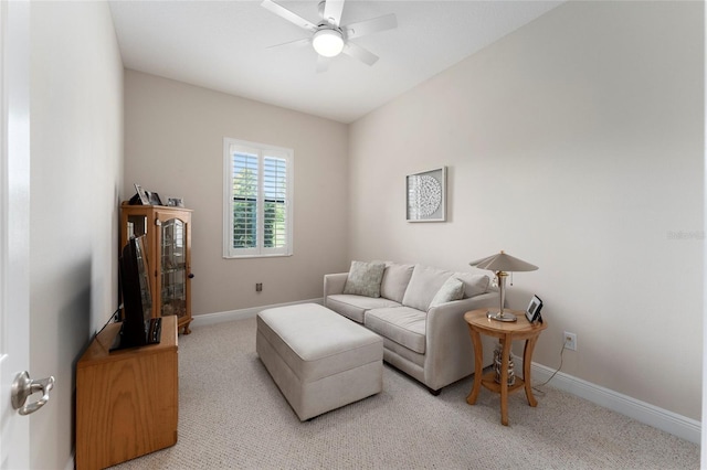 living room with light carpet and ceiling fan