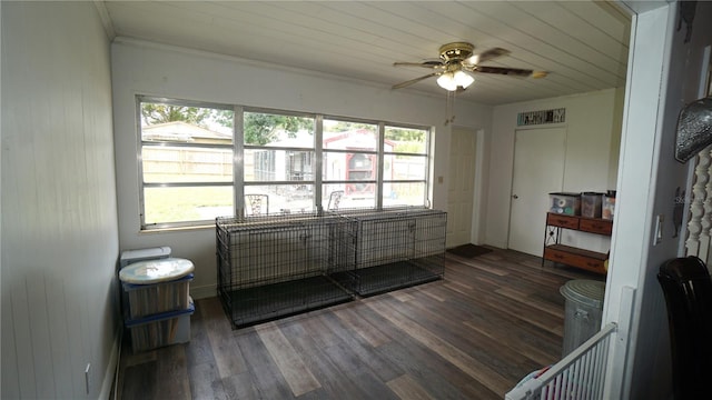 sunroom with wood ceiling and ceiling fan