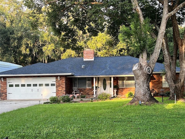 ranch-style house with a garage and a front yard