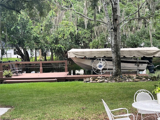 view of yard with a wooden deck