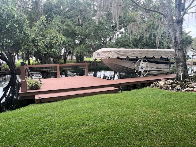 exterior space featuring a water view and a boat dock