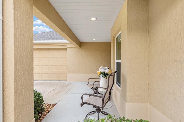 view of patio / terrace with a garage