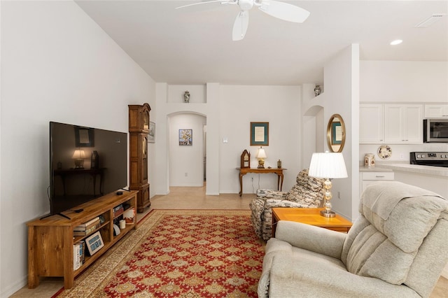 living room featuring ceiling fan