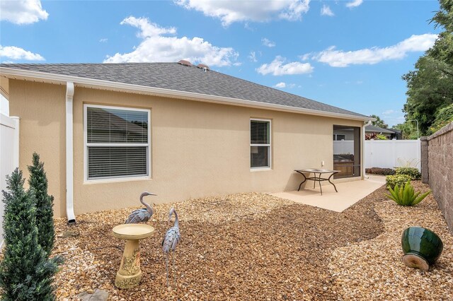 rear view of property with a patio