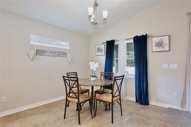 dining room with an inviting chandelier and a healthy amount of sunlight