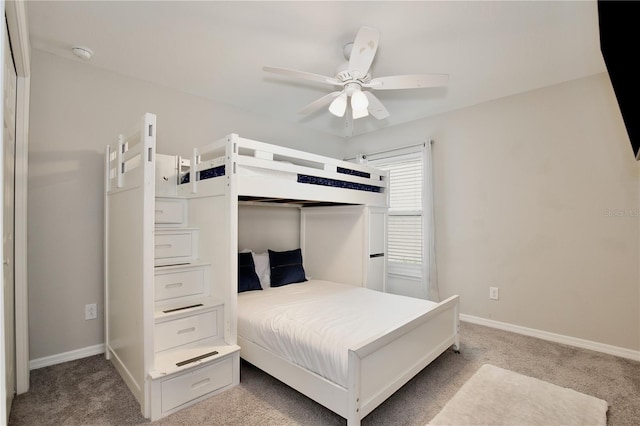 bedroom with ceiling fan and carpet floors