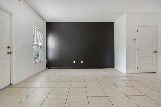 view of tiled spare room