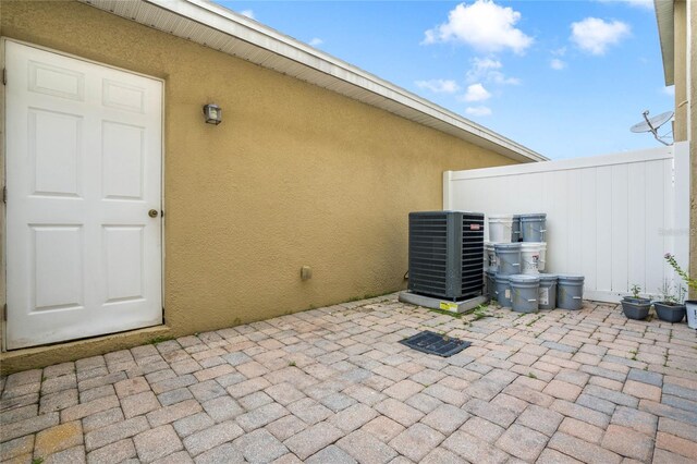 view of patio featuring cooling unit