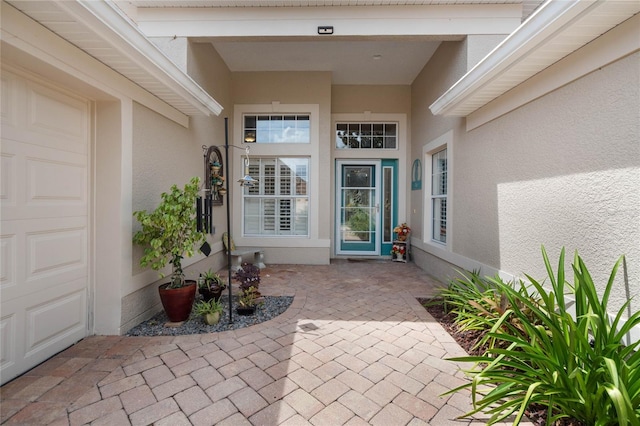 property entrance featuring a garage