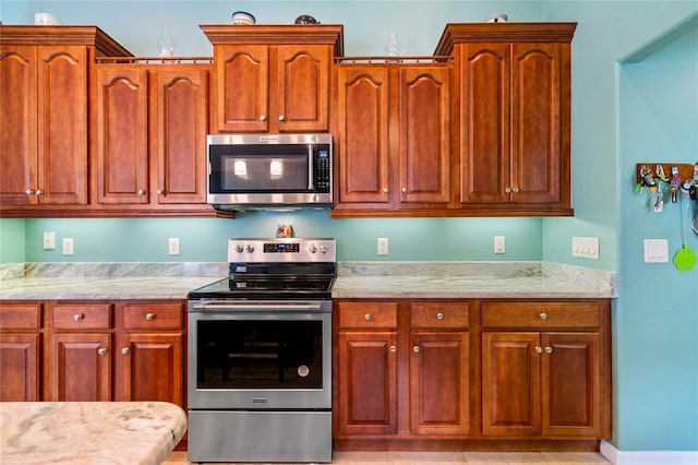 kitchen with appliances with stainless steel finishes