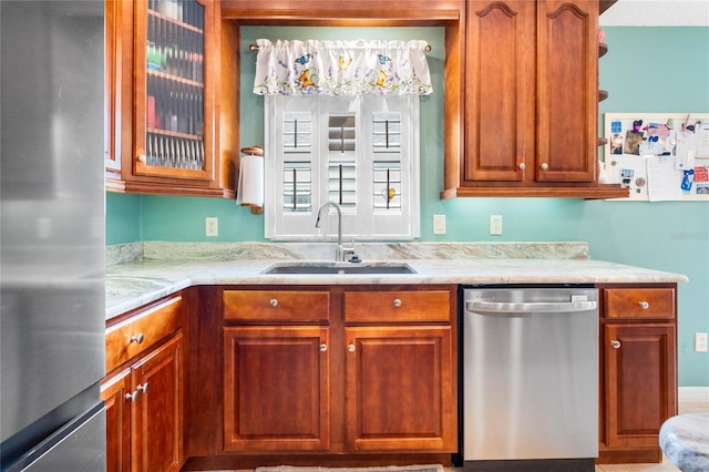 kitchen with appliances with stainless steel finishes and sink