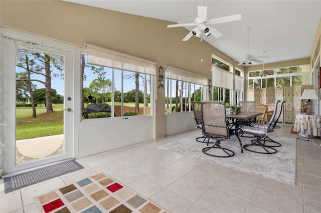 sunroom / solarium with ceiling fan and a healthy amount of sunlight