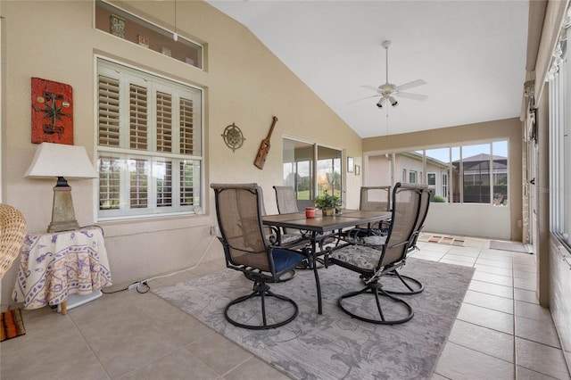 sunroom with lofted ceiling and ceiling fan