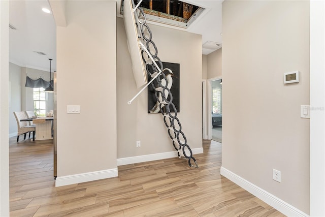 staircase featuring hardwood / wood-style floors