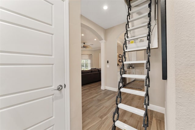 interior space with ceiling fan and hardwood / wood-style flooring