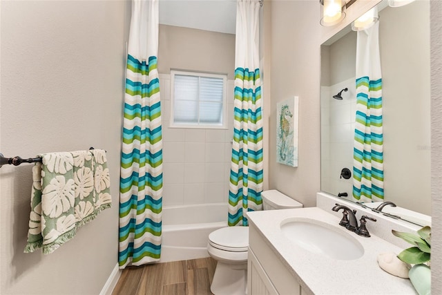 full bathroom with shower / bath combo with shower curtain, toilet, hardwood / wood-style flooring, and vanity