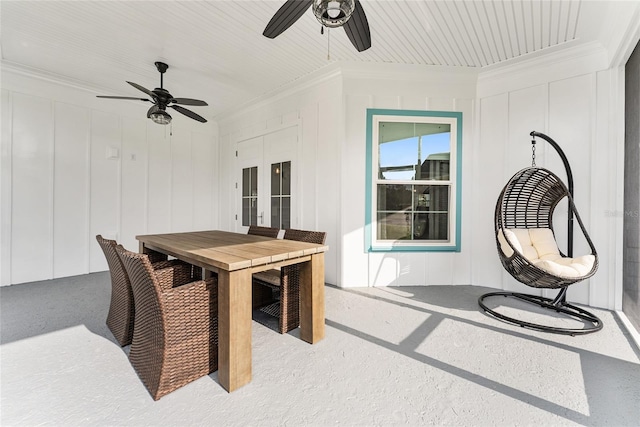 dining area featuring ceiling fan, ornamental molding, and french doors