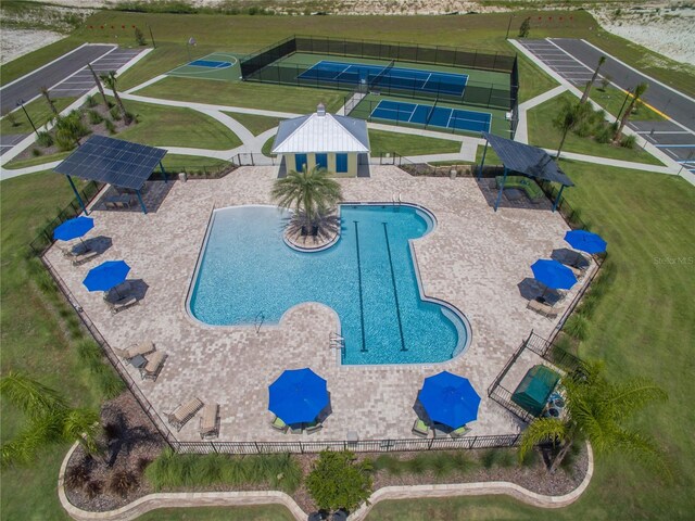 view of swimming pool with a patio