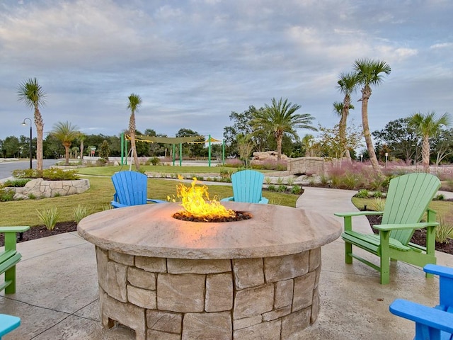 view of patio featuring an outdoor fire pit