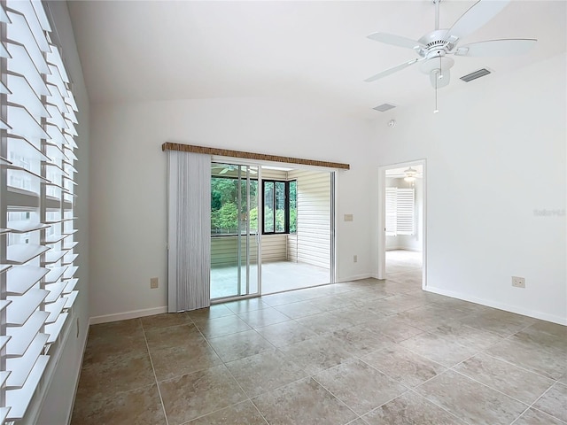 spare room with lofted ceiling and ceiling fan