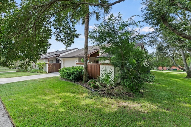 view of property exterior with a lawn