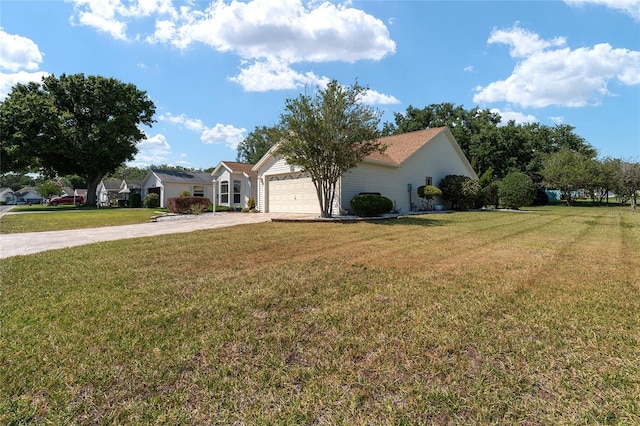 view of front of house featuring a garage and a front yard