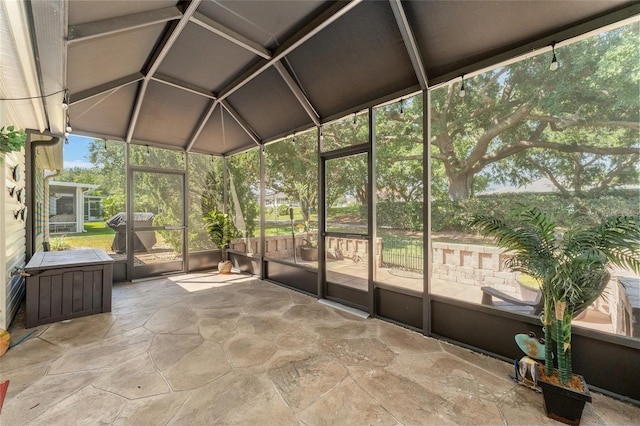 unfurnished sunroom with a healthy amount of sunlight