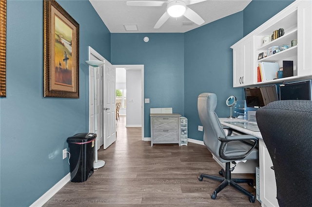 office with ceiling fan and dark wood-type flooring