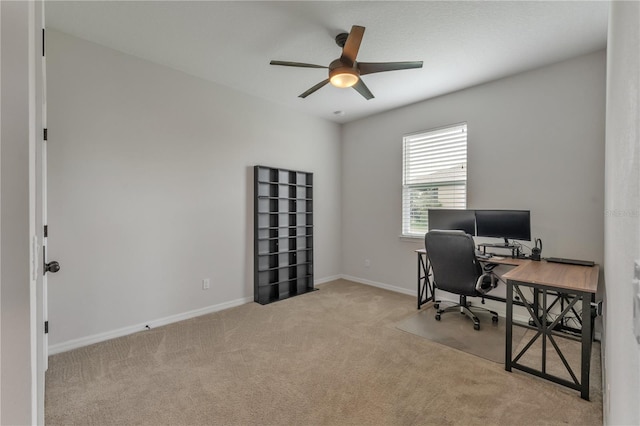 office with ceiling fan and light colored carpet