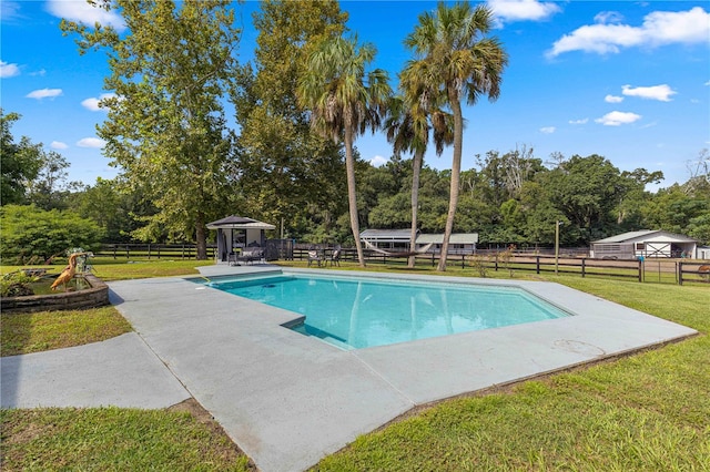 view of swimming pool featuring a gazebo, a lawn, and a patio area