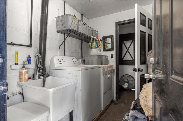 laundry area with sink and washer and dryer