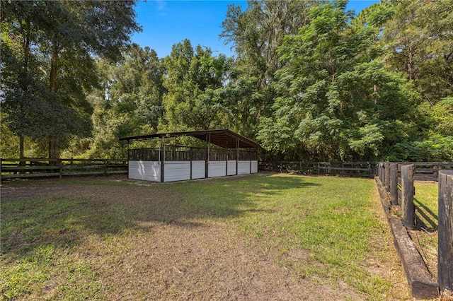 view of yard with an outdoor structure