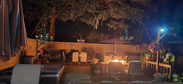 view of patio at twilight