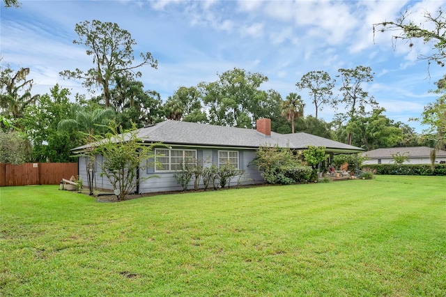 view of front of house with a front lawn