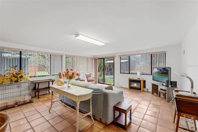 tiled living room with a fireplace