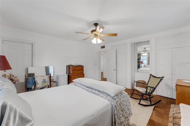 bedroom with parquet flooring and ceiling fan