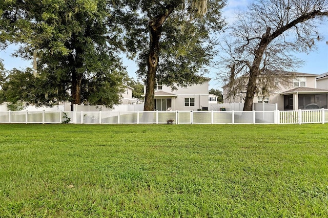 view of yard featuring a sunroom