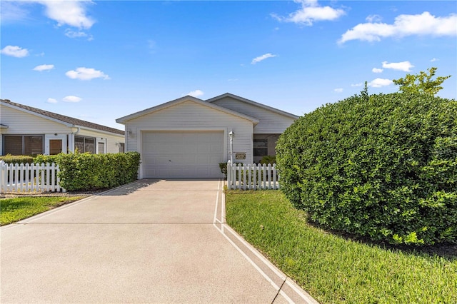 single story home featuring a front yard and a garage