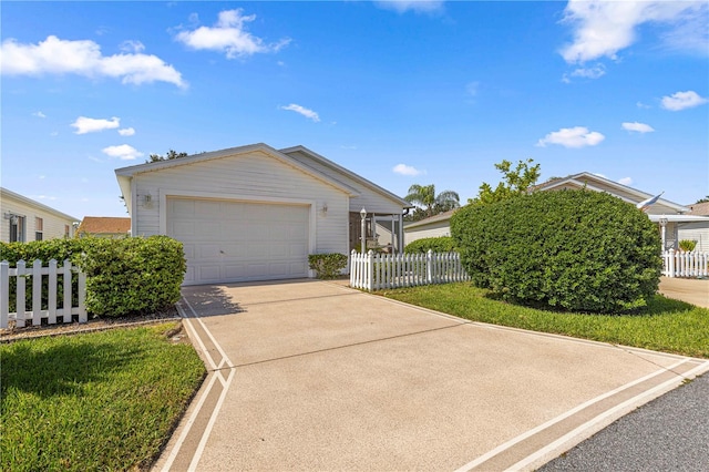 view of front of house with a front lawn and a garage