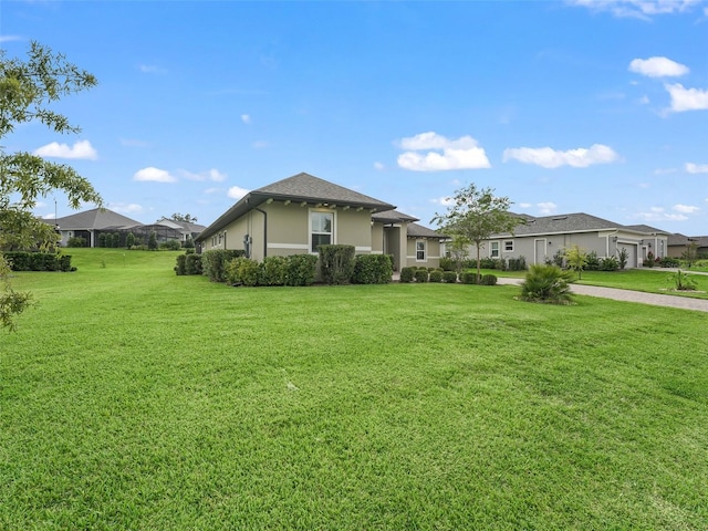 exterior space with a front yard