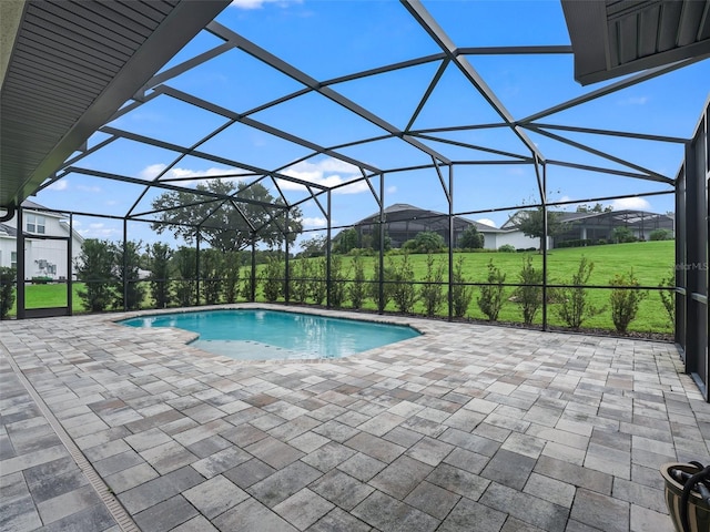 view of pool featuring a lanai and a patio area