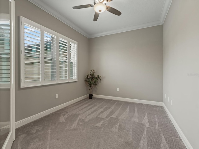 unfurnished room featuring carpet floors, ceiling fan, and crown molding