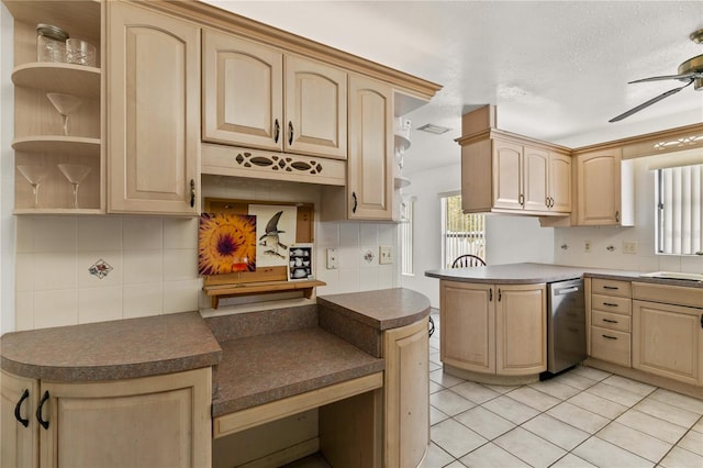 kitchen featuring light brown cabinetry, dishwasher, tasteful backsplash, and light tile patterned flooring