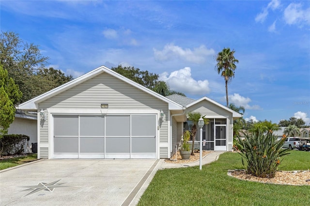 view of front facade featuring a garage and a front lawn