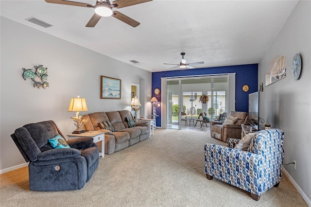 living room with carpet floors and ceiling fan