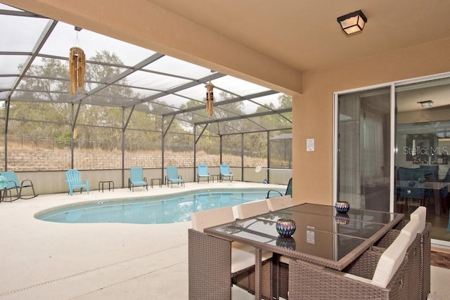 view of pool featuring a patio and a lanai