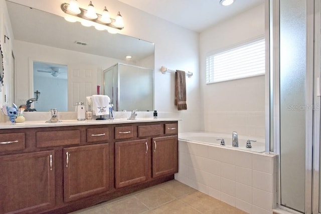 bathroom featuring shower with separate bathtub, vanity, ceiling fan, and tile patterned floors