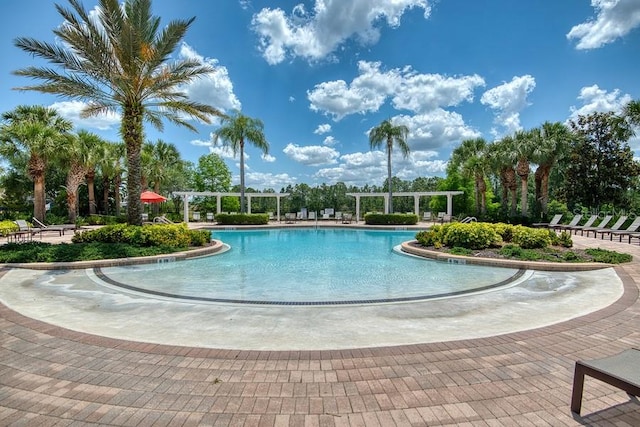 436 Orange Cosmos Blvd, Davenport, FL 33837 - community pool with a pergola